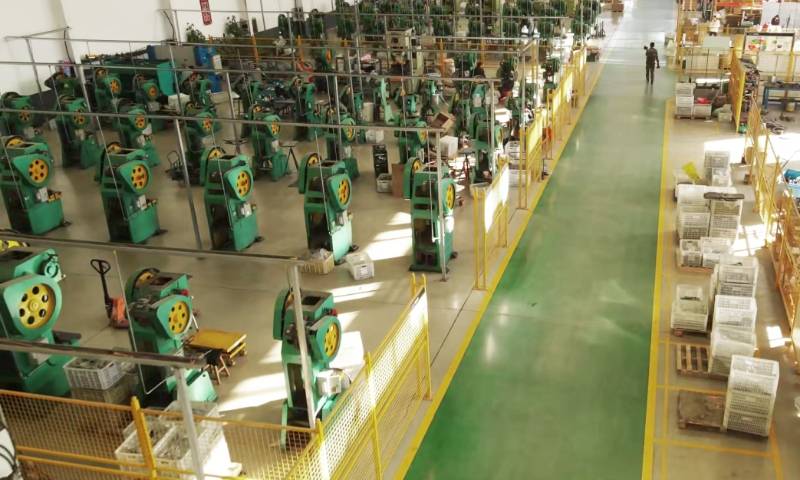 Hundreds of processing machines are placed in the workshop.